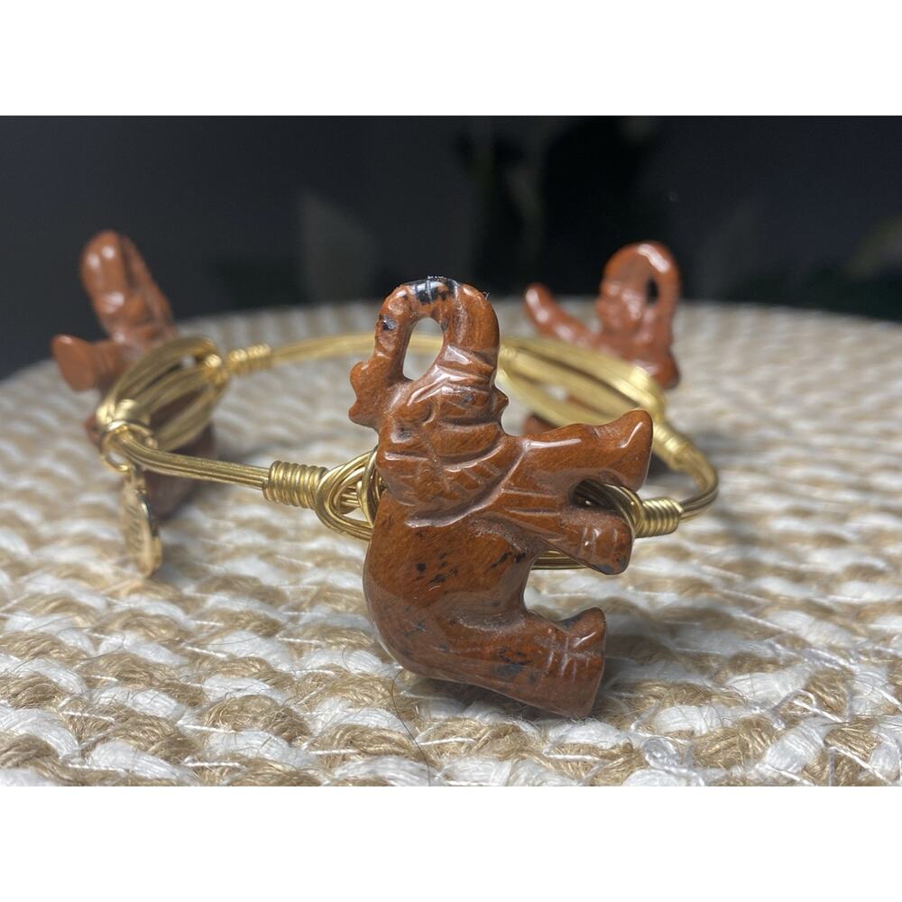 Bourbon and Bowties Gold Tone Wired Elephant Stone Bracelet